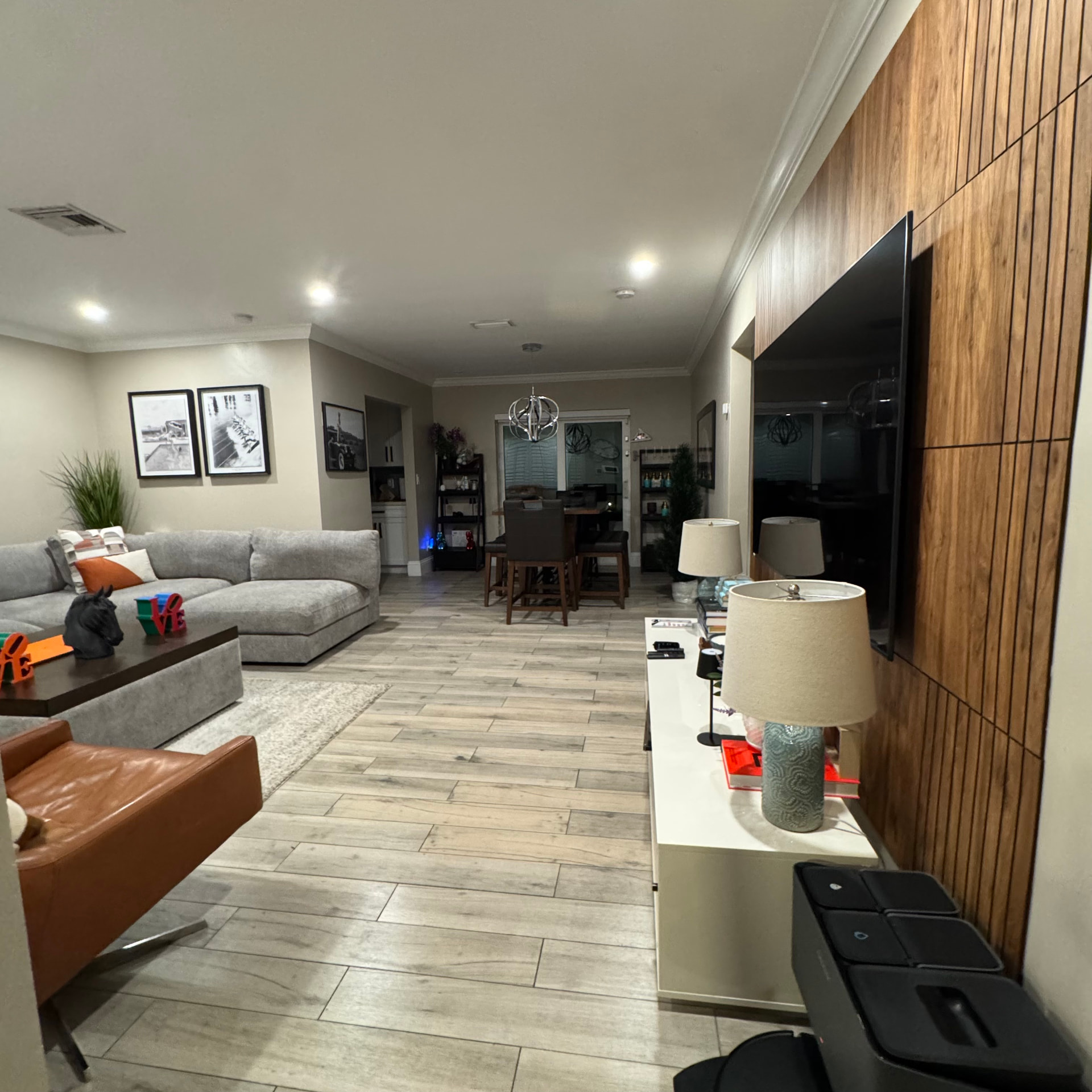 Tidy open living and dining area after a full home cleaning